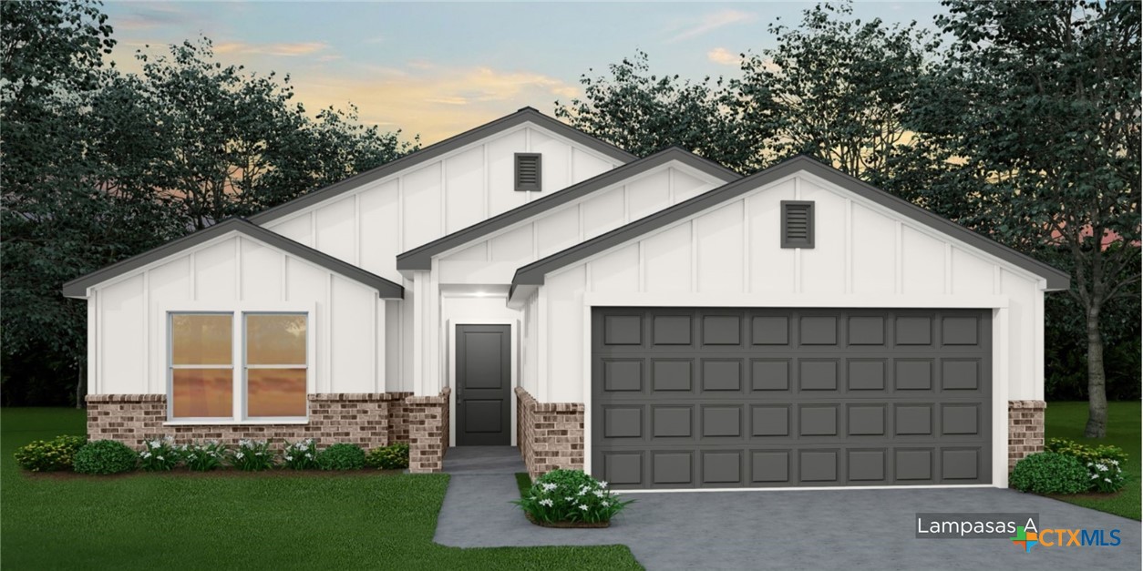 a view of a backyard of the house