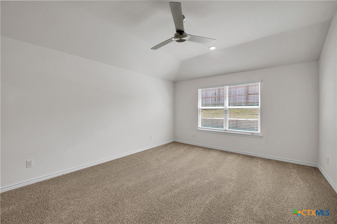 203 Wind Ridge Drive Copperas Cove, TX 76522 - Photo 6 of 16 a view of an empty room with a window