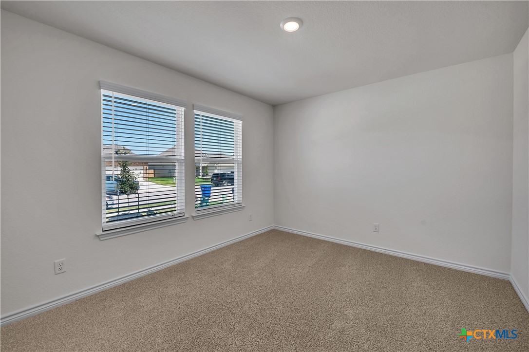 203 Wind Ridge Drive Copperas Cove, TX 76522 - Photo 7 of 16 an empty room with windows