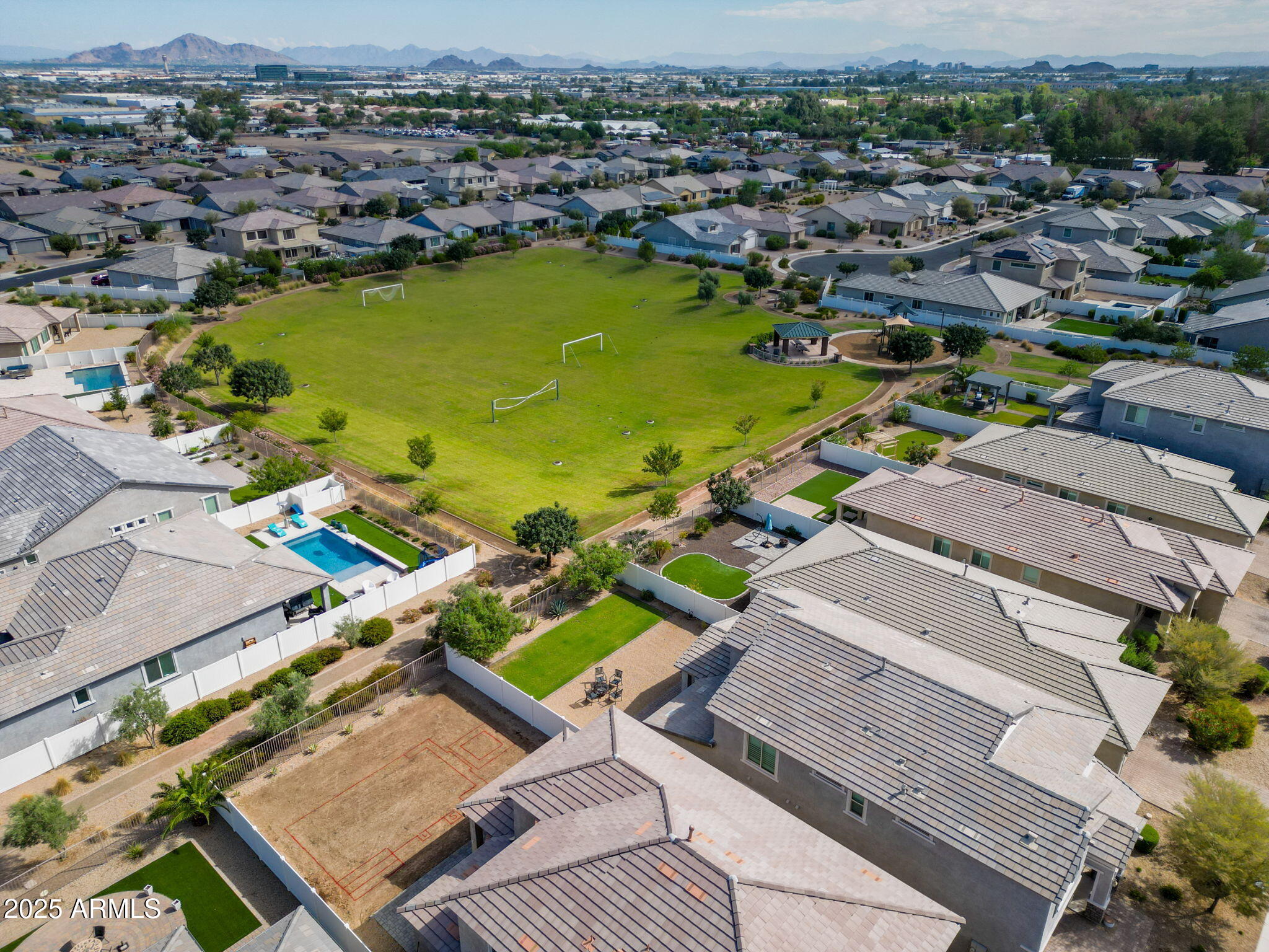 6562 South 24th Place Phoenix, AZ 85042 - Photo 22 of 22 an aerial view of a residential houses with outdoor space