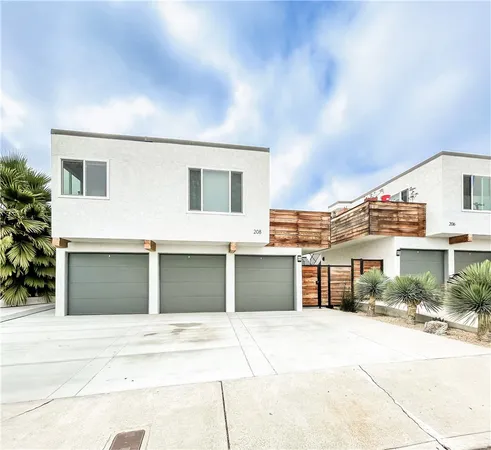 a front view of a house with a garage