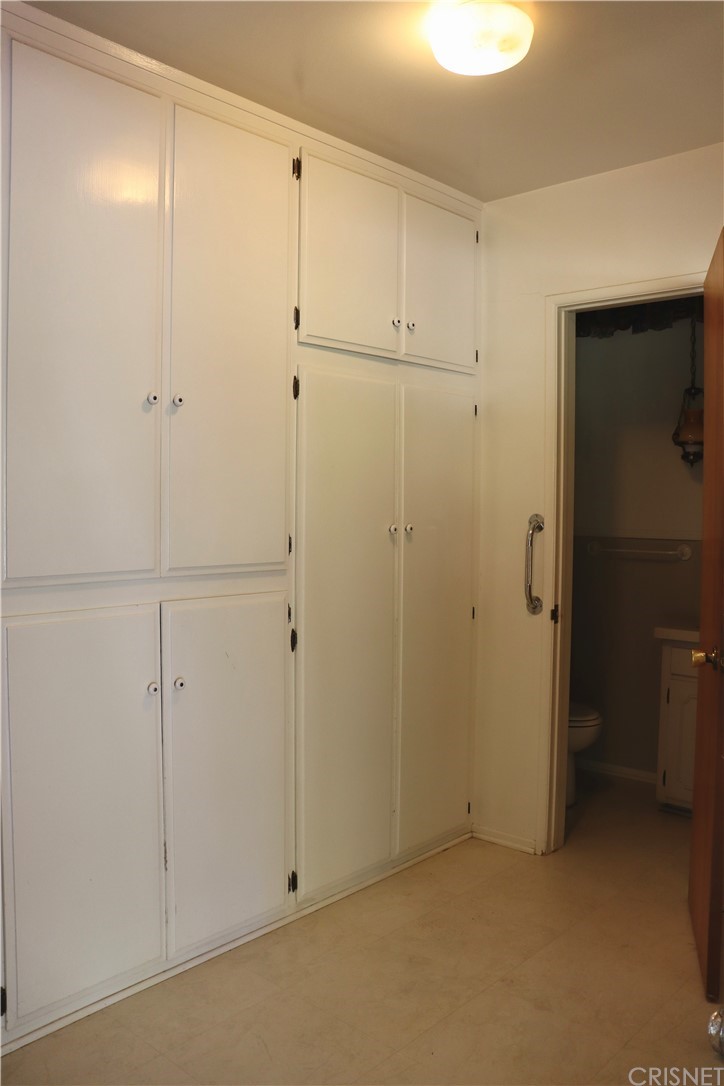 11240 Balcom Avenue Granada Hills, CA 91344 - Photo 16 of 23 a view of room with closet area