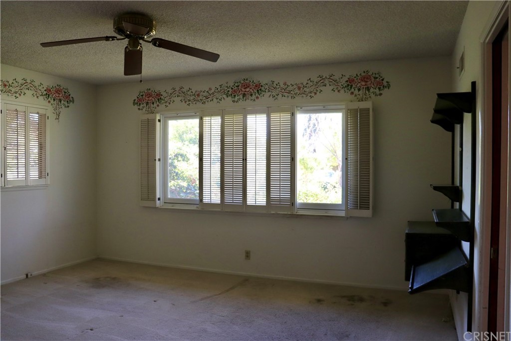 11240 Balcom Avenue Granada Hills, CA 91344 - Photo 22 of 23 an empty room with a window