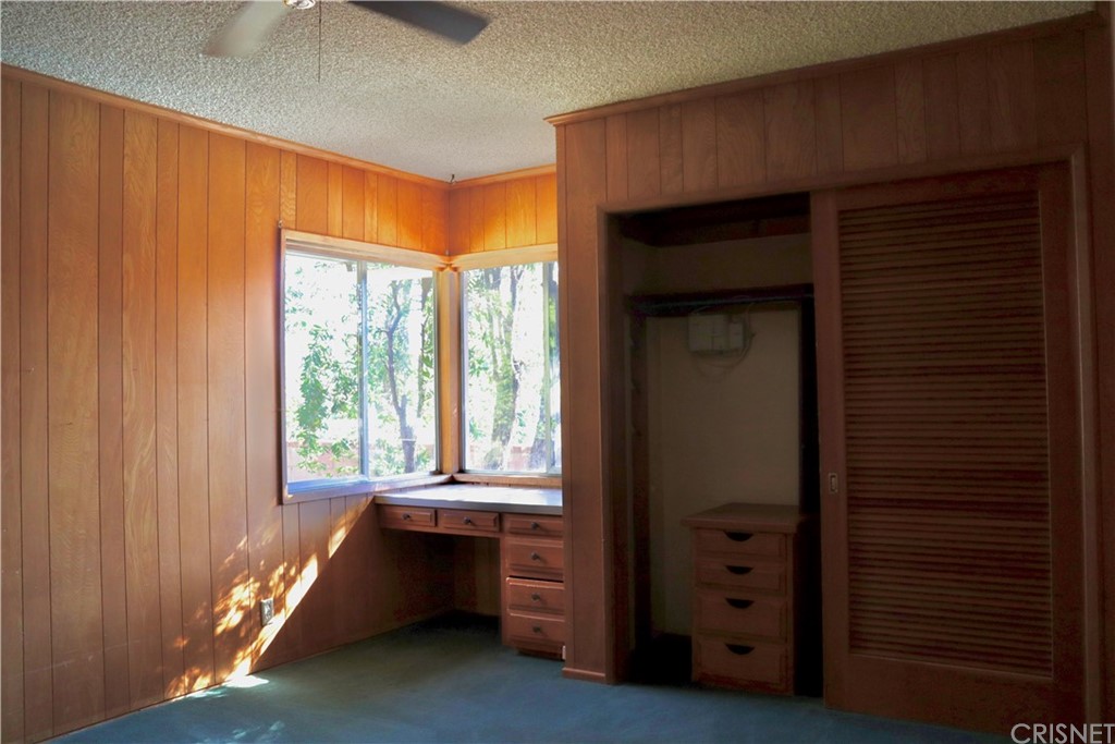 11240 Balcom Avenue Granada Hills, CA 91344 - Photo 23 of 23 a bed room with a bed and a window