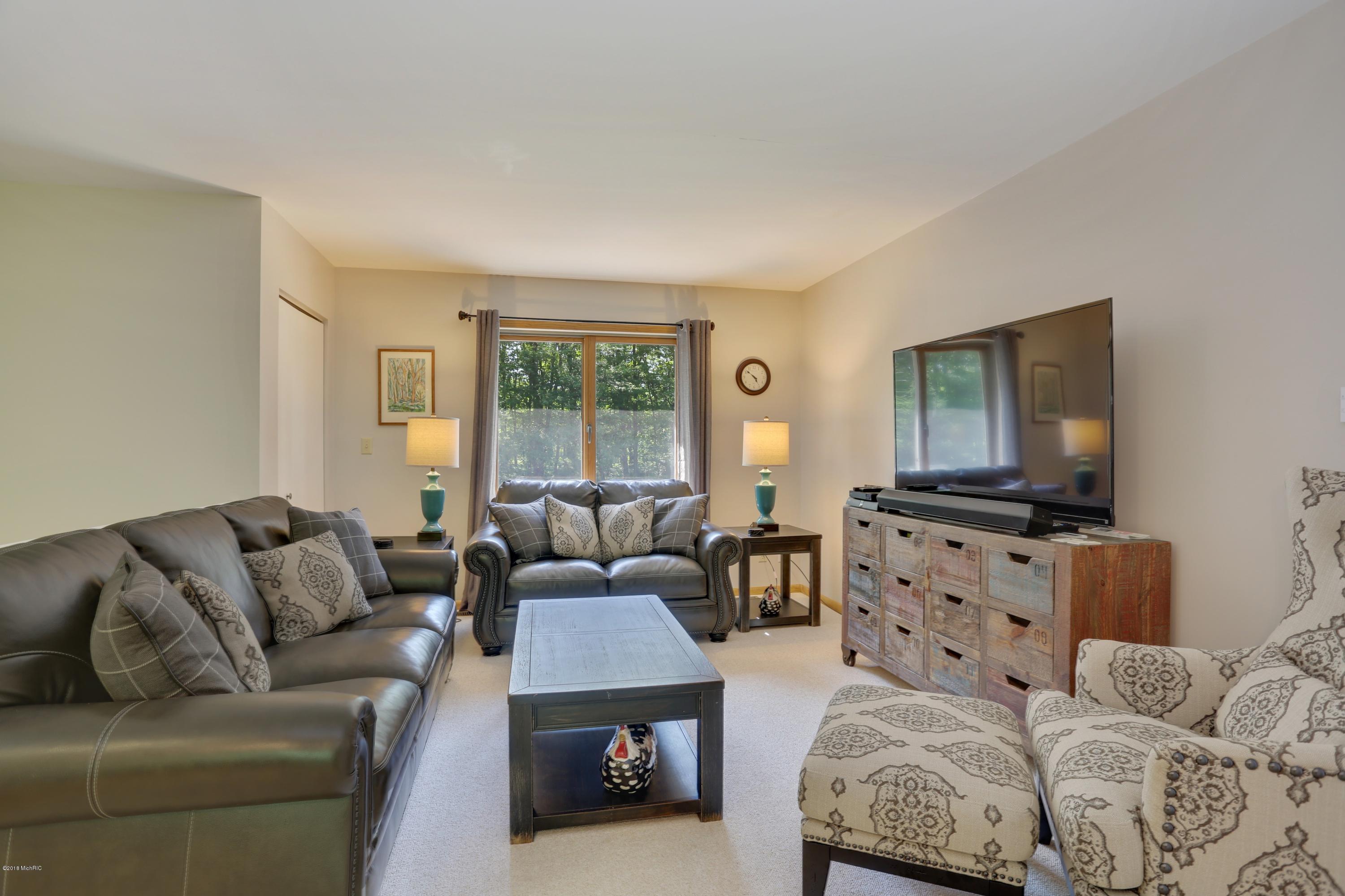8111 Kruger Road Three Oaks, MI 49128 - Photo 27 of 32 21_8111KrugerRd_50_GuestHouseLivingRoom_