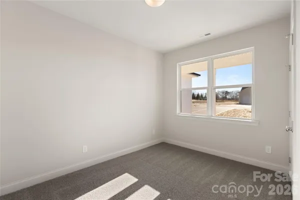 a workspace with furniture and window