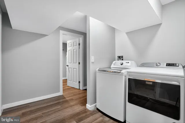 a utility room with washer and dryer