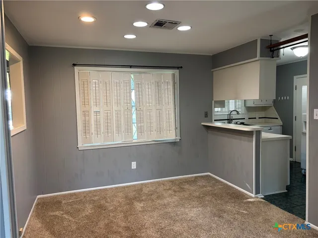 a view of kitchen and window