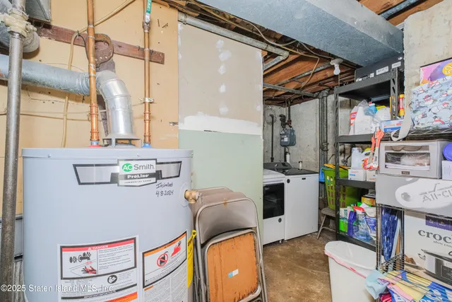 a storage room with washer and dryer