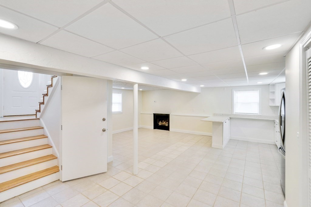 129 Watervale Road, Unit 129 Medford, MA 02155 - Photo 21 of 29 a view of a livingroom with a staircase