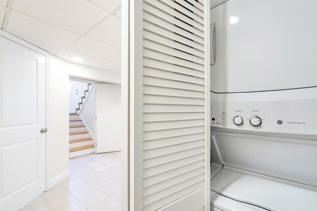 129 Watervale Road, Unit 129 Medford, MA 02155 - Photo 23 of 29 a view of a hallway with stairs
