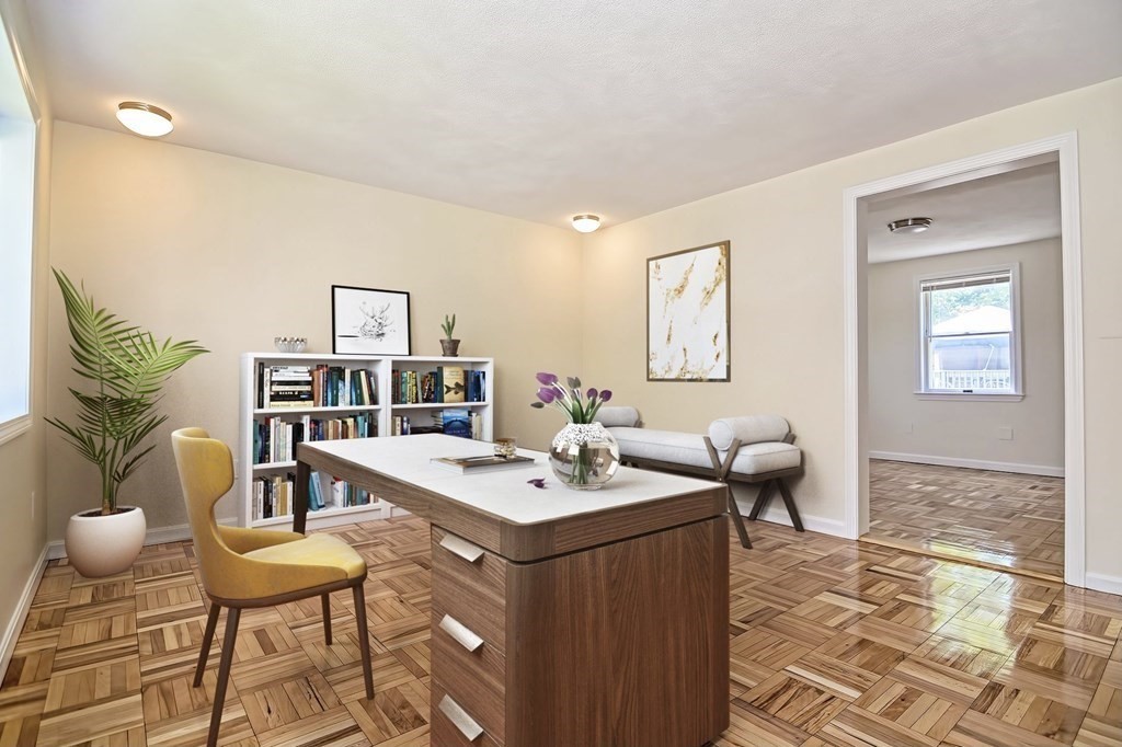 129 Watervale Road, Unit 129 Medford, MA 02155 - Photo 10 of 29 a view of a workspace with furniture