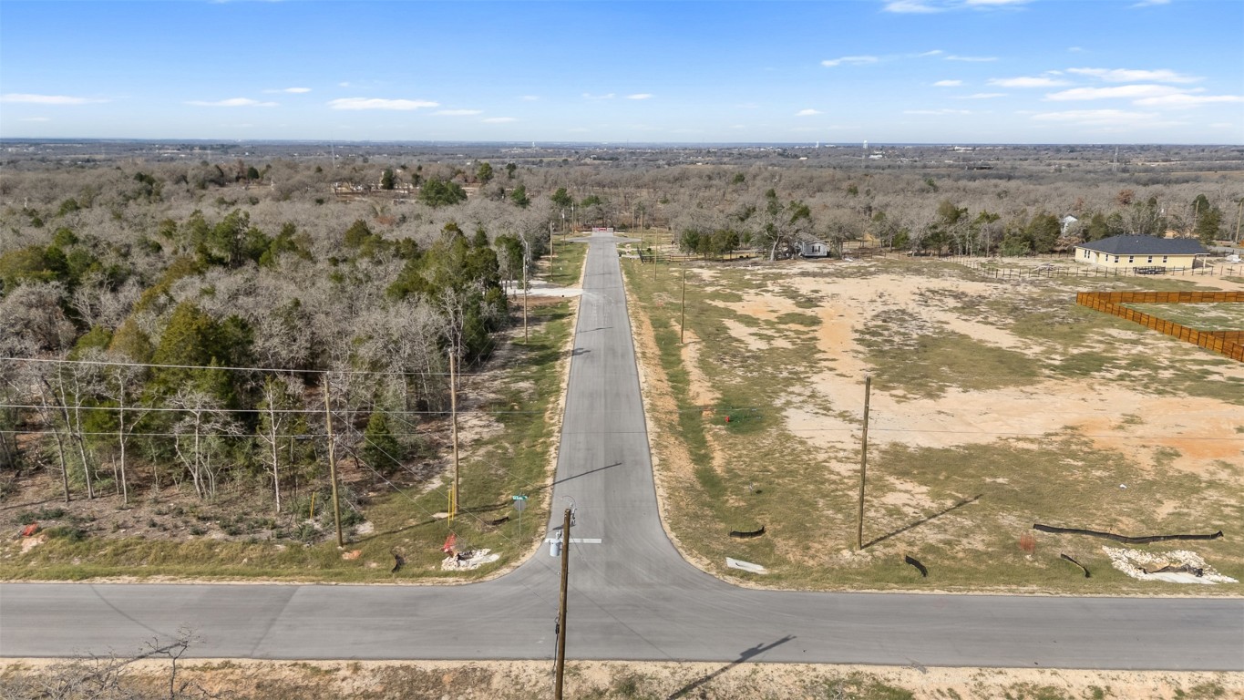 136 Las Alturas Drive Elgin, TX 78621 - Photo 4 of 6 a view of a yard