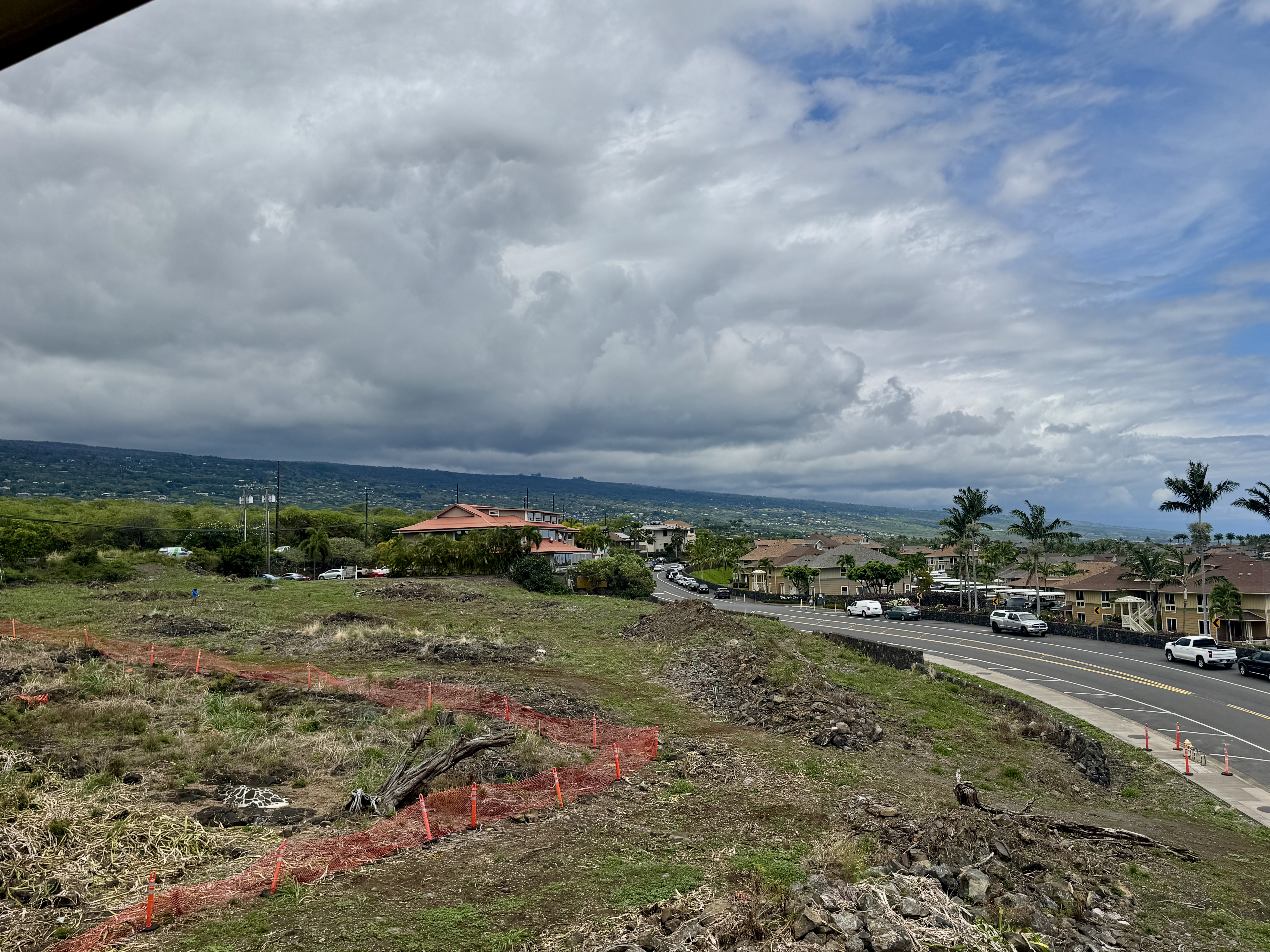 75-5873 Walua Road, Unit 312 Kailua-Kona, HI 96740 - Photo 15 of 15 a view of a town with couple of cars parked in the yard