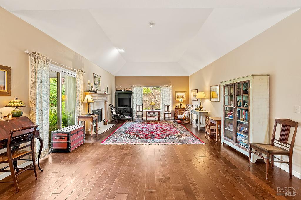 6252 Meadowstone Drive Santa Rosa, CA 95409 - Photo 13 of 33 a living room with furniture and a wooden floor