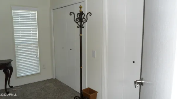 a view of a hallway with a window