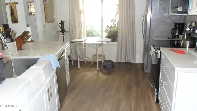 a view of a living room and dining room