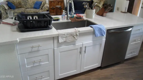 a kitchen with stainless steel appliances a stove and a refrigerator
