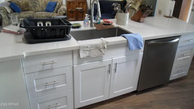 a kitchen with stainless steel appliances a stove and a refrigerator