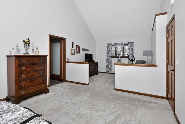 a room with furniture a washer and dryer