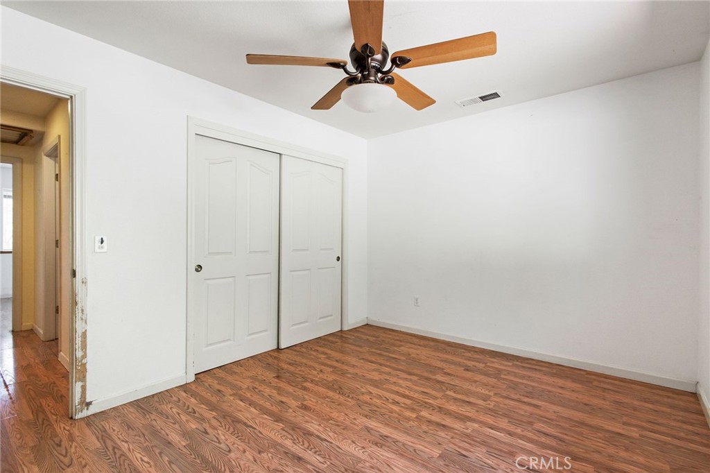 4940 Papya Road Forest Ranch, CA 95942 - Photo 19 of 67 wooden floor in an empty room