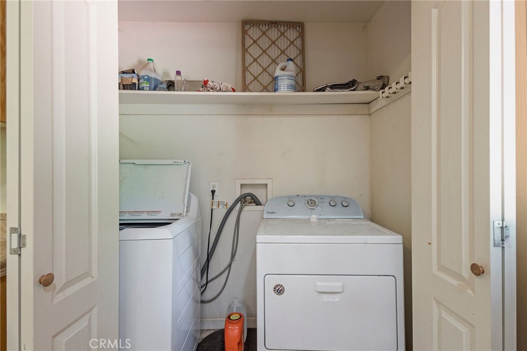 4940 Papya Road Forest Ranch, CA 95942 - Photo 20 of 67 a utility room with dryer and washer