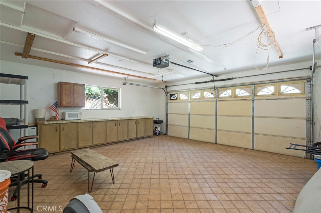4940 Papya Road Forest Ranch, CA 95942 - Photo 21 of 67 a view of a garage with wooden floor