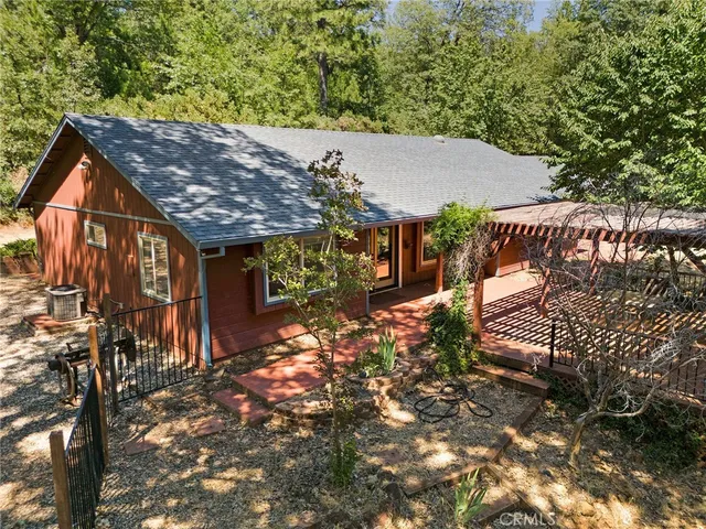 a front view of house with yard garage and garage