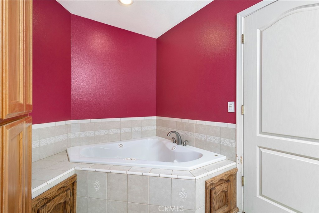 4940 Papya Road Forest Ranch, CA 95942 - Photo 27 of 67 a bathroom with a sink and a bathtub
