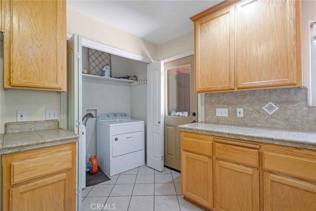 4940 Papya Road Forest Ranch, CA 95942 - Photo 28 of 67 a view of a kitchen with sink dryer and washer