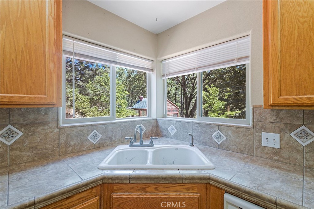 4940 Papya Road Forest Ranch, CA 95942 - Photo 29 of 67 a view of a sink and a window in a kitchen
