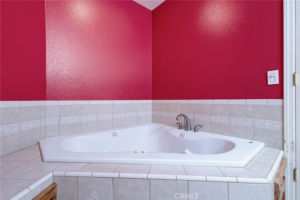 4940 Papya Road Forest Ranch, CA 95942 - Photo 30 of 67 a bathroom with a sink and a mirror