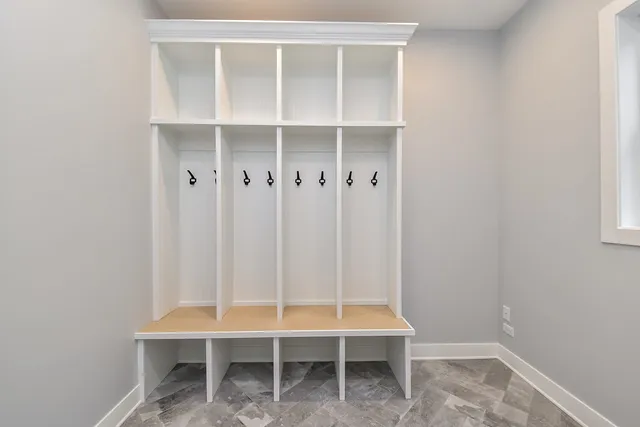 a room with table and chairs