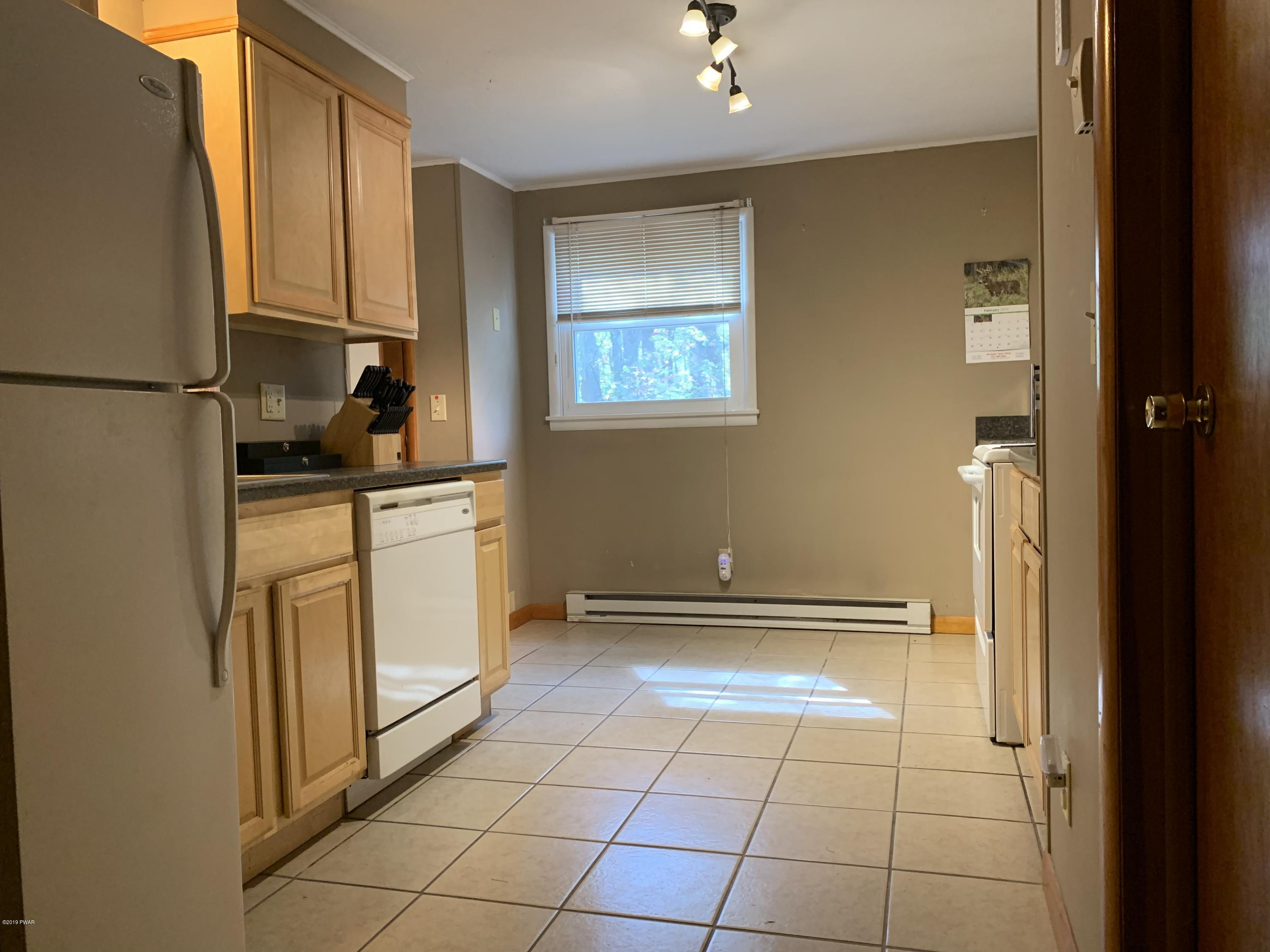 218 Springbrook Road Shohola, PA 18458 - Photo 6 of 19 Bright and Open Kitchen