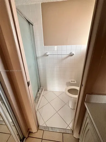 a bathroom with a sink and a shower