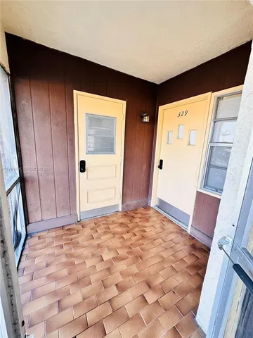 a bathroom with a bathtub and a toilet