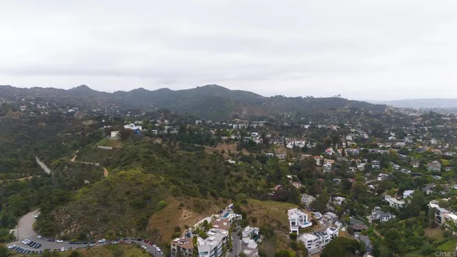 a view of a city with mountains in the background