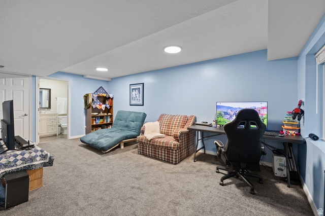 1625 Pages Pl Drive Bountiful, UT 84010 - Photo 26 of 31 Living/Office space with light carpet and baseboards
