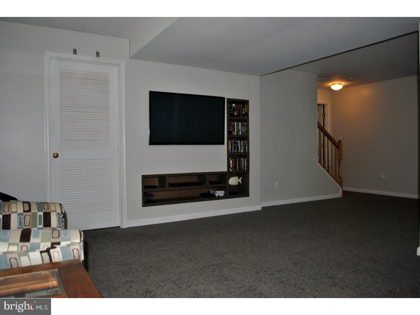 1854 Dixie Line Road Newark, DE 19702 - Photo 19 of 24 a living room with furniture and a flat screen tv
