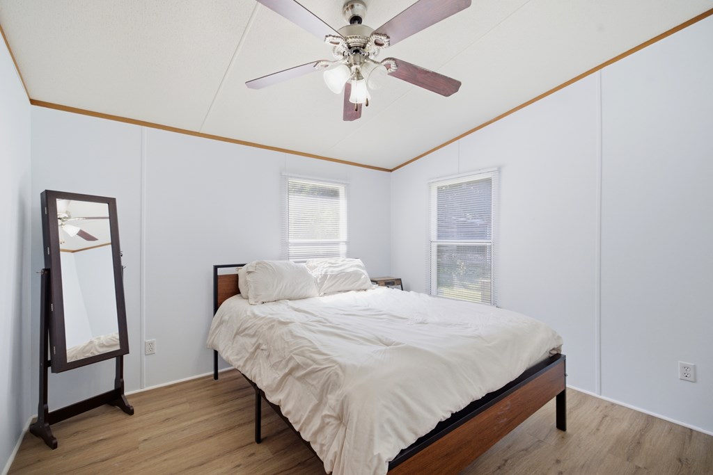 503 Whitten Road Waterloo, SC 29384 - Photo 19 of 31 a bedroom with a bed and a window