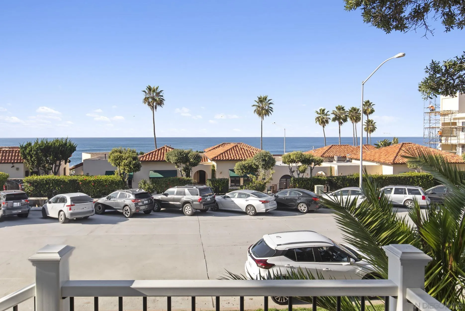 725 Coast S Boulevard La Jolla, CA 92037 - Photo 5 of 23 a group of cars parked in front of a house