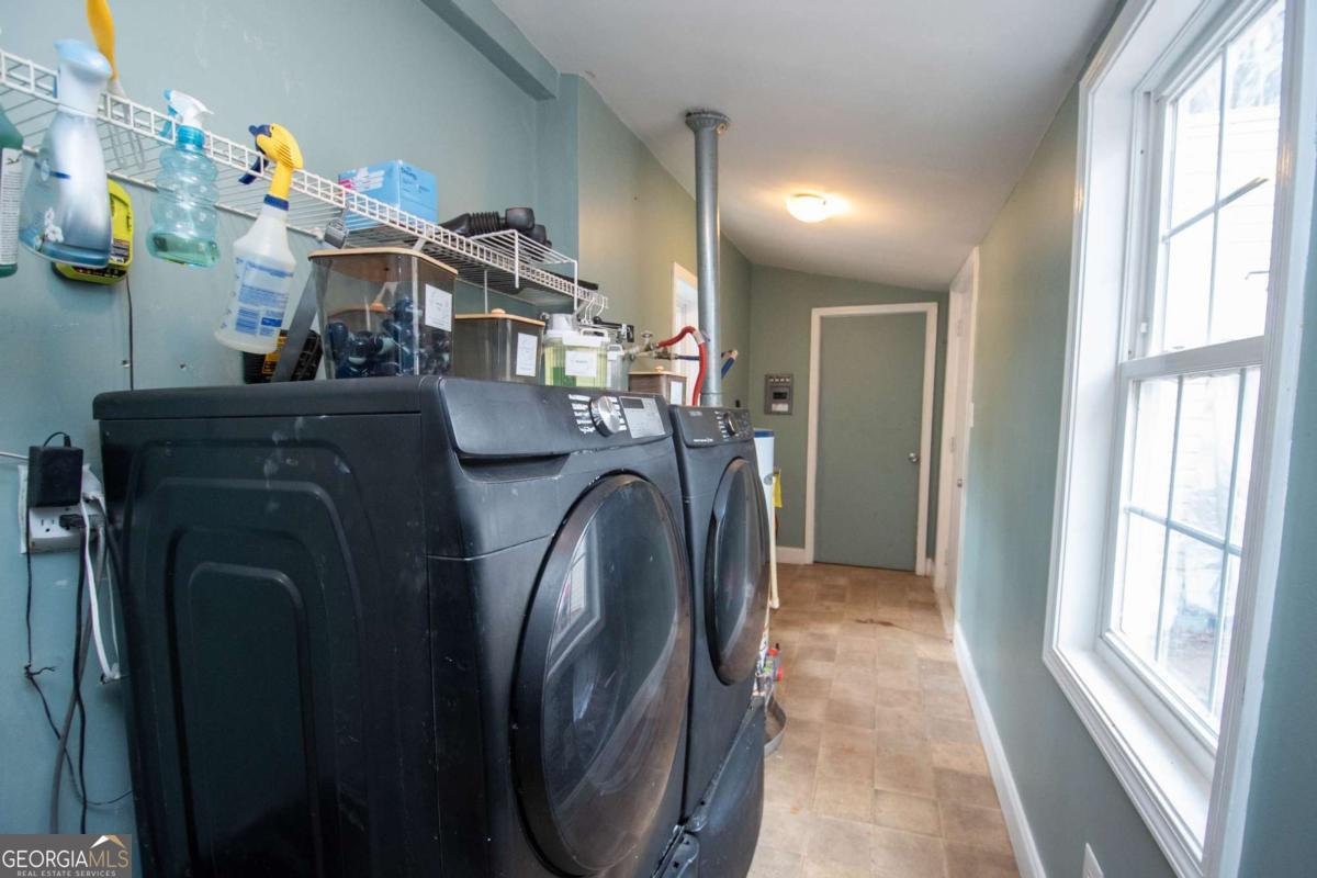 134 Rustica Drive Newnan, GA 30263 - Photo 19 of 32 a utility room with dryer and washer