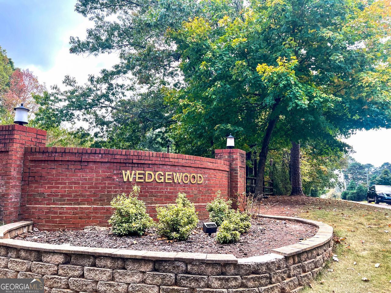 6379 Wedgeview Court Tucker, GA 30084 - Photo 14 of 16 a view of a sign in a yard