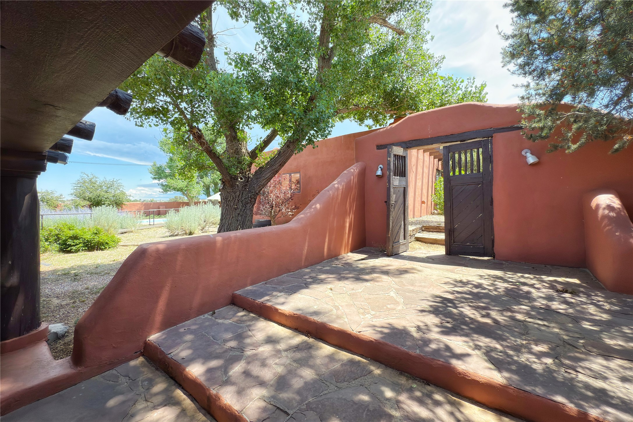 54 Rons Road Santa Fe, NM 87508 - Photo 62 of 99 Entrance to Main House and pool, patio areas
