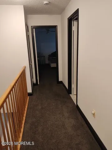 a view of a hallway from a hallway