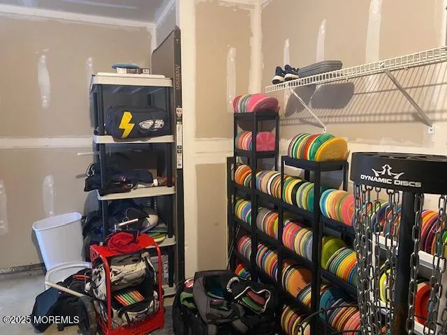 a utility room with lots of stuff and toys