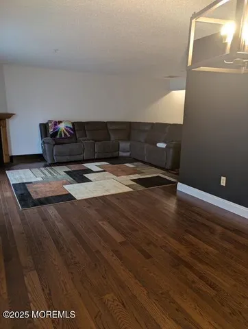 a view of kitchen with wooden floor