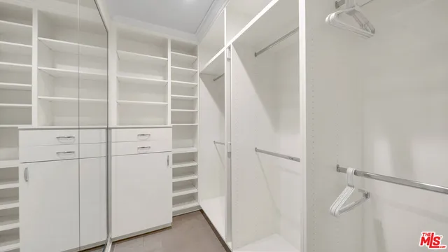 an aerial view of a house with outdoor space