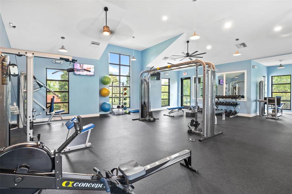 9406 Lamine Way Parrish, FL 34219 - Photo 23 of 74 a view of a room with gym equipment