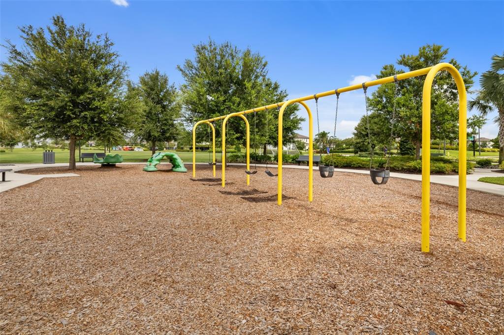 9406 Lamine Way Parrish, FL 34219 - Photo 27 of 74 a view of a park with slide